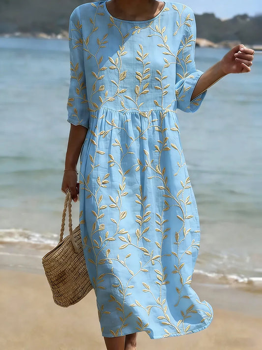 Natalie | Vestido midi de cuello redondo con estampado de plantas y flores